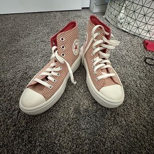 Size 7 platform, Converse with a plaid design, never worn.
